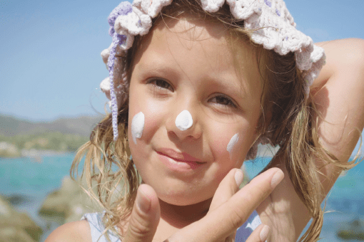 Girl Applying Sun Cream